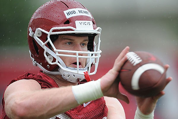 Arkansas tight end Hudson Henry (82) makes a catch Saturday, Aug. 3, 2019, during practice at the university practice field in Fayetteville. 