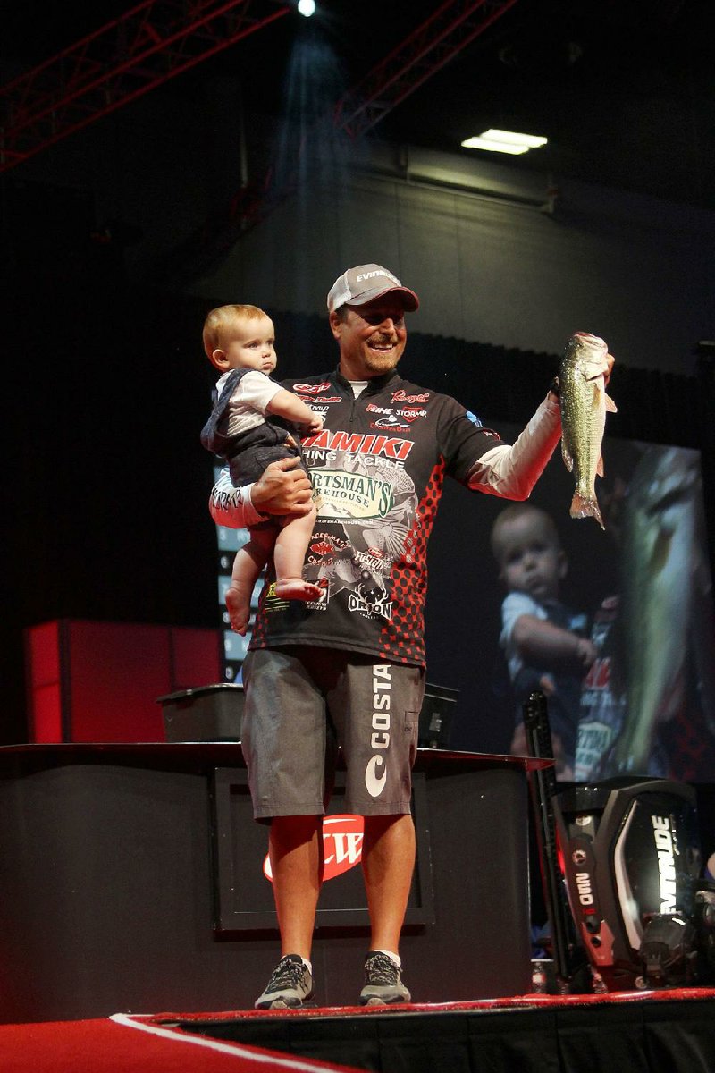 Bryan Thrift of Shelby, N.C., caught five fish weighing 12 pounds, 7 ounces on Saturday to maintain his lead at the FLW Cup on Lake Hamilton. Thrift leads Kyle Walters of Grant Valkaria, Fla., by 24 ounces going into today’s champion- ship round.