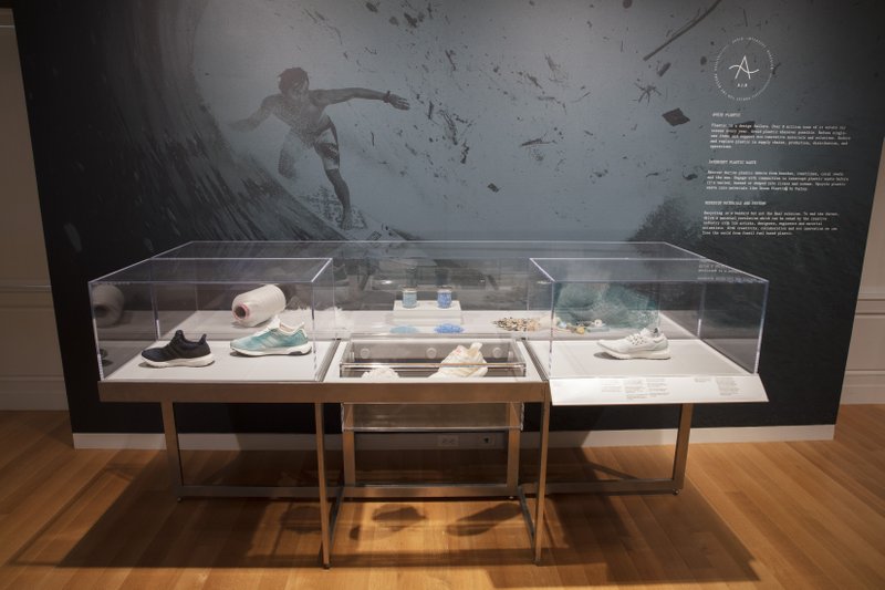 This 2019 photo shows an Installation view of &quot;Nature&#x2014;Cooper Hewitt Design Triennial&quot; in New York. The exhibit of cutting edge innovations at the Cooper Hewitt, Smithsonian Design Museum, on view through January 20, 2020, includes a prototype for Adidas sneakers made of recycled ocean plastic and another prototype of sneakers that can be cleaned, broken down and remade entirely with the same material. (Matt Flynn/Cooper Hewitt, Smithsonian Design Museum via AP)