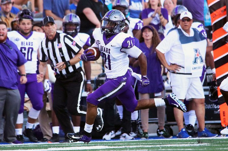 Kierre Crossley (center) said he and teammate Carlos Blackman push each other at the running back position for Central Arkansas. The Bears open the season Aug. 29 at Western Kentucky.