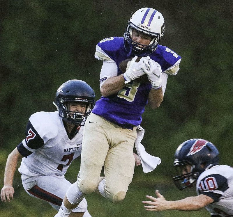 Junior Hayden Brent (left) returns at running back and defensive back for the Baptist Prep Eagles. 