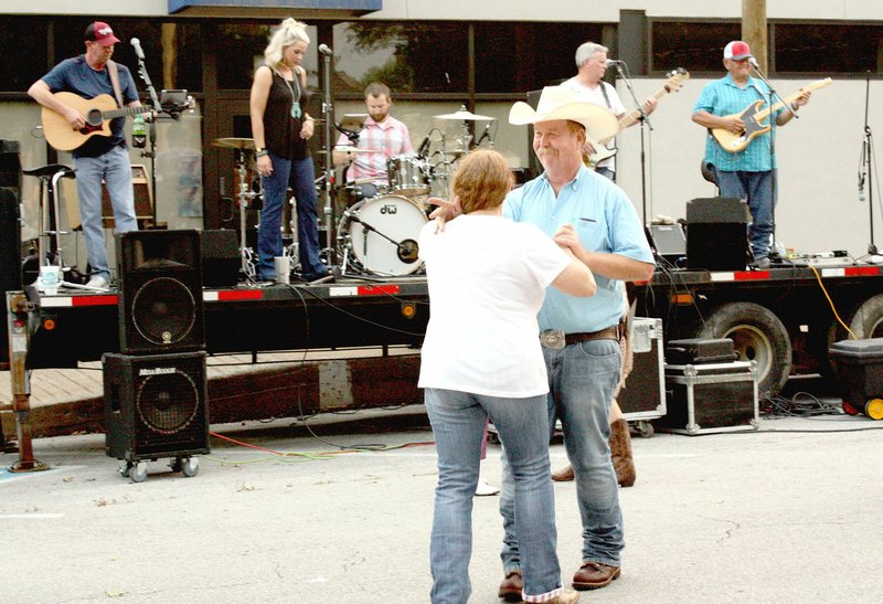 MARK HUMPHREY ENTERPRISE-LEADER Dancing was enjoyed on the Lincoln Square Wednesday, Aug. 7, 2019, as the 66th annual Lincoln Rodeo events kicked off with the shindig. Howard Lester &amp; the Boston Mountain Playboys expertly played what has become one of the longest running gigs in the music business. Louie Guess, 86, of Lincoln, established the street dance as part of the rodeo in 1967.