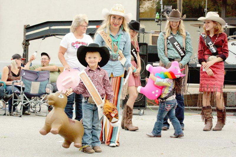 MARK HUMPHREY ENTERPRISE-LEADER Porter "Gauge" Perkins, 3-year-old son of Charlie and Christy Perkins, of Farmington, emerged from the 2019 Lincoln Riding Club Little Mister contest with the title and two handsful of horses. Chloie Thomas, 2018 LRC princess, was available to assist Gauge, but the junior cowboy had no problems handling the horses. See more rodeo stories and photos in the Sports section.