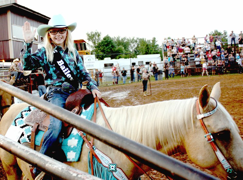MARK HUMPHREY ENTERPRISE-LEADER/Bailey Sizemore, 10, of Watts, Okla., shown during Saturday's grand entry at the 66th annual Lincoln Rodeo, won the 2019 title of princess for the Lincoln Riding Club.