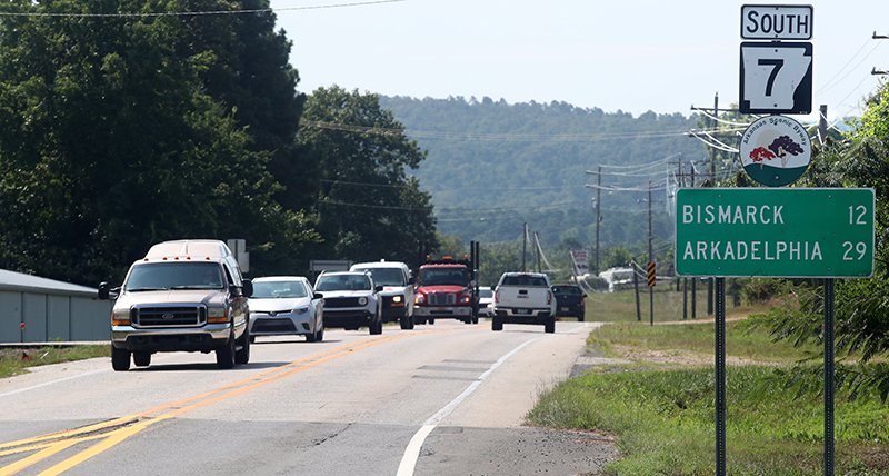 The Sentinel-Record/Richard Rasmussen IMPROVED SAFETY: Motorists travel Tuesday where improvements are planned for Highway 7 south. The almost 4-mile project includes a center turn lane and a new bridge over Sorrells Creek.