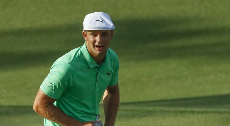 Bryson DeChambeau rects after missing a putt on the 15th hole during the first round for the Masters golf tournament Thursday, April 11, 2019, in Augusta, Ga. 