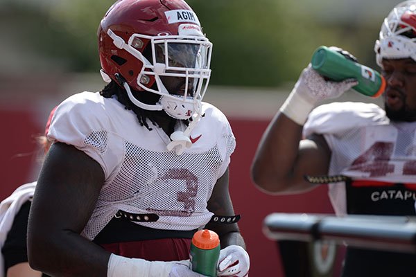 Arkansas defensive lineman McTelvin Agim is shown Tuesday, Aug. 13, 2019, during practice at the university practice facility in Fayetteville.