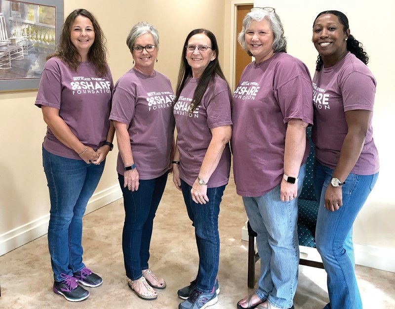 SHARE Foundation
SHARE Foundation employees gathered last Tuesday to celebrate the non-profit’s recognition as one of the best workplaces in Arkansas. Employees were treated to a free lunch from Kernal Mustard’s Hot Dog Cart & Catering, cake and ice cream and a t-shirt commemorating the recognition. Pictured here, from left to right, are Jenifer McLelland, executive director of Life Touch Hospice; Debbie Watts, vice president of community impact; Betty Dowty, receptionist; Heather McGarity, human resource manager; and Andreka Curley, human resource assistant.