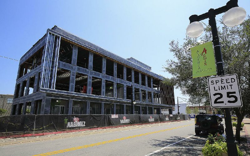 This office building going up at 600 Main St. in North Little Rock will be the new location for the North Little Rock Convention and Visitors Bureau, as well as Taggart Architects and the Arkansas Automobile Dealers Association. 