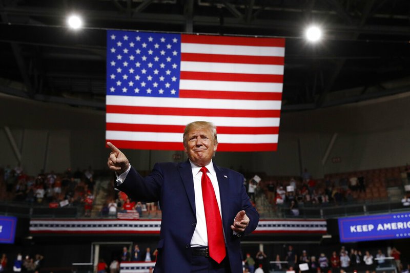 President Donald Trump reacts at the end of his speech at a campaign rally, Thursday, Aug. 15, 2019, in Manchester, N.H. (AP Photo/Patrick Semansky)