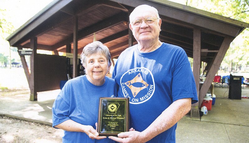 Submitted phot CAMPERS OF THE YEAR: Arkansas Campers on a Mission recognized Mike and Erma Wimsett, of Hot Springs, as its Campers of the Year at its 2019 spring rally in Maumelle. The couple were honored for the volunteer work they do on behalf of the organization, a fellowship of Christian campers who volunteer throughout the state. The Wimsetts attend First Baptist Church and also volunteer at the Hot Springs Senior Center, where they teach line dancing.