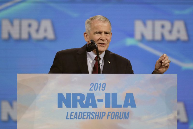 The Associated Press FORUM SPEAKER: National Rifle Association President Col. Oliver North speaks at the National Rifle Association Institute for Legislative Action Leadership Forum on April 26 at Lucas Oil Stadium in Indianapolis. New York's attorney general's office is questioning North on Tuesday as it probes whether the NRA broke laws governing its nonprofit status.