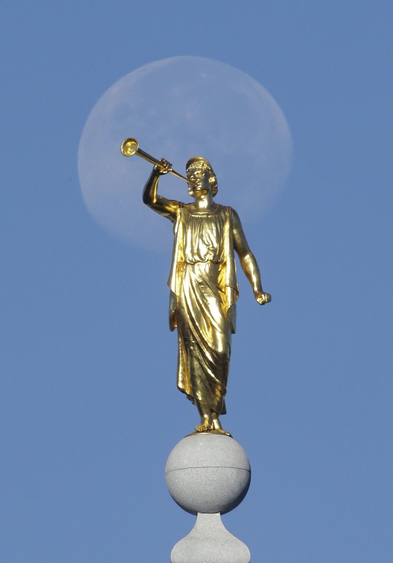  In this Sept. 11, 2014, file photo, the angel Moroni statue sits atop the Salt Lake Temple of The Church of Jesus Christ of Latter-day Saints at Temple Square in Salt Lake City.  (AP Photo/Rick Bowmer, File)