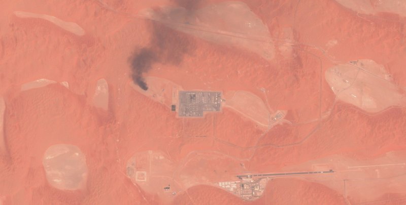 This Saturday, Aug. 17, 2019 false-color image from the European Commission's Sentinel-2 satellite that was processed by Sinergise's Sentinel Hub website shows smoke rising from a natural gas facility at the Shaybah oil field in Saudi Arabia after a drone attack claimed by Yemen's Houthi rebels. Drones launched by the Houthis attacked a massive oil and gas field deep inside Saudi Arabia's sprawling desert on Saturday, causing what the kingdom described as a &quot;limited fire&quot; in the second such recent attack on its crucial energy industry. (European Commission via AP)