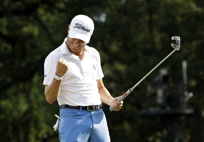 Justin Thomas celebrates after sinking a birdie on the 18th green during the final round of the BMW Championship. Thomas defeated Patrick Cantlay by three strokes and leads the FedEx Cup standings. 