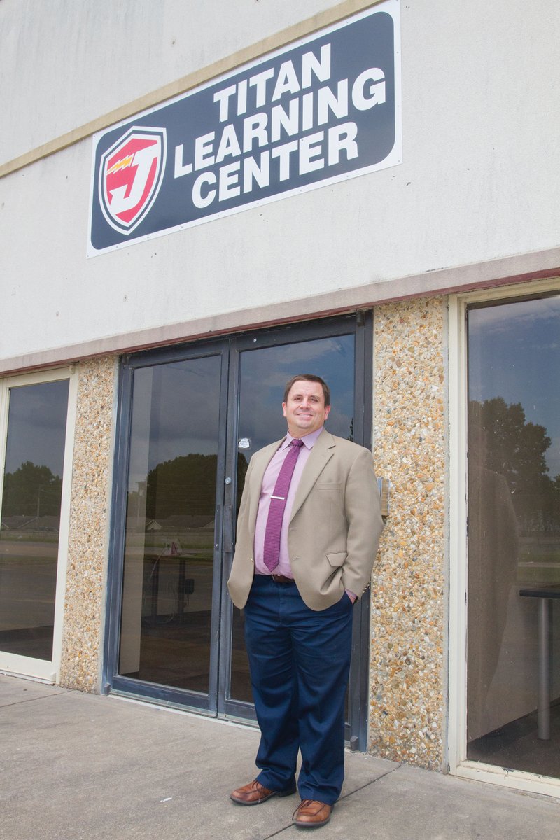 Jake Smith, director of student services and federal programs for the Jacksonville North Pulaski School District, stands outside the Titan Learning Center, which is part of a new alternative learning education facility on John Harden Drive in Jacksonville.