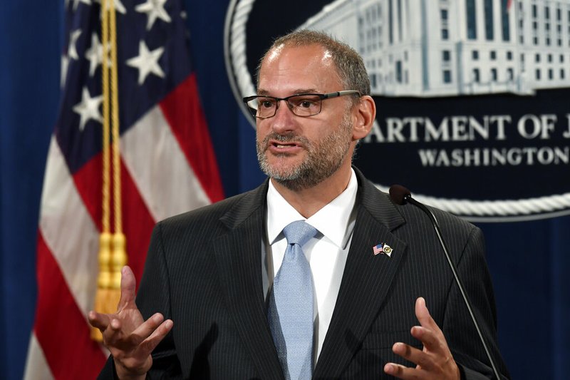 FILE - In this July 19, 2019, file photo, acting Director of the Bureau of Prisons Hugh Hurwitz speaks during a news conference at the Justice Department in Washington. Hurwitz has been removed from his post more than a week after millionaire financier Jeffrey Epstein took his own life while in federal custody. Attorney General William Barr announced Hugh Hurwitz’s termination Monday, Aug. 19. (AP Photo/Susan Walsh, File)