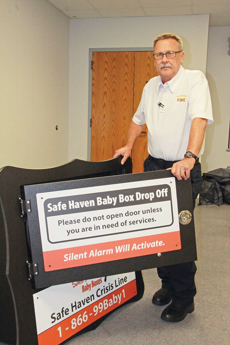 Chief Bill Ford of the Benton Fire Department stands behind the new Safe Haven Baby Box that will be installed at Station No. 3 on Edison Street later this month. The Benton Fire Department will be the first emergency-service agency in Arkansas to have a baby box. 
