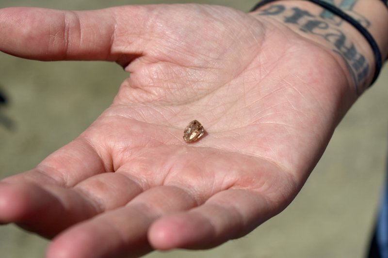 A Texas woman on Friday found a 3.72-carat yellow diamond at Crater of Diamonds State Park, officials said. 