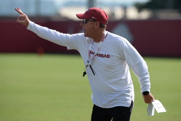 Arkansas coach Chad Morris speaks to his team Tuesday, Aug. 20, 2019, during practice at the university's practice facility in Fayetteville. Visit nwadg.com/photos to see more photographs from the practice.