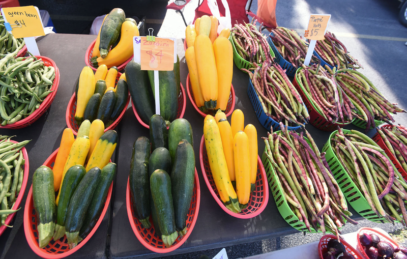 Eating more veggies and fruits? Farmers Markets, such as this one in Rogers, are a great source. (NWA Democrat-Gazette file photo/FLIP PUTTHOFF)
