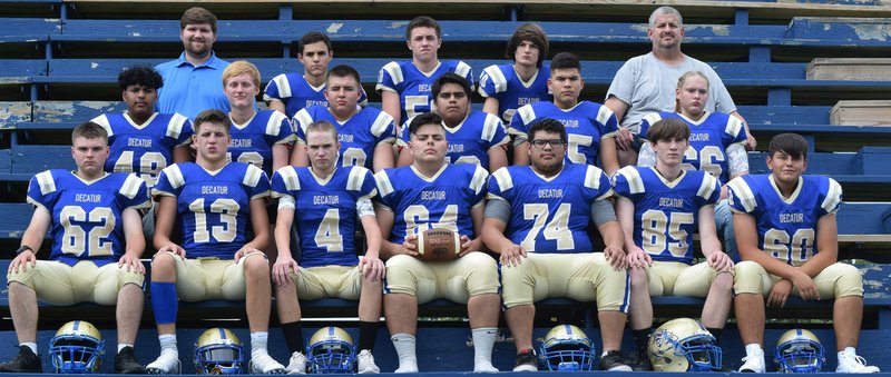 Westside Eagle Observer/MIKE ECKELS The 2019 Decatur Bulldog eight-man football team at Bulldog Stadium in Decatur Aug. 13. Decatur plays its first game of the season at home Aug. 30 against the Engineers from Watts, Okla.