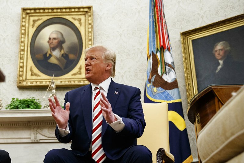 President Donald Trump speaks during a meeting with Romanian President Klaus Iohannis in the Oval Office of the White House, Tuesday, Aug. 20, 2019, in Washington. (AP Photo/Alex Brandon)