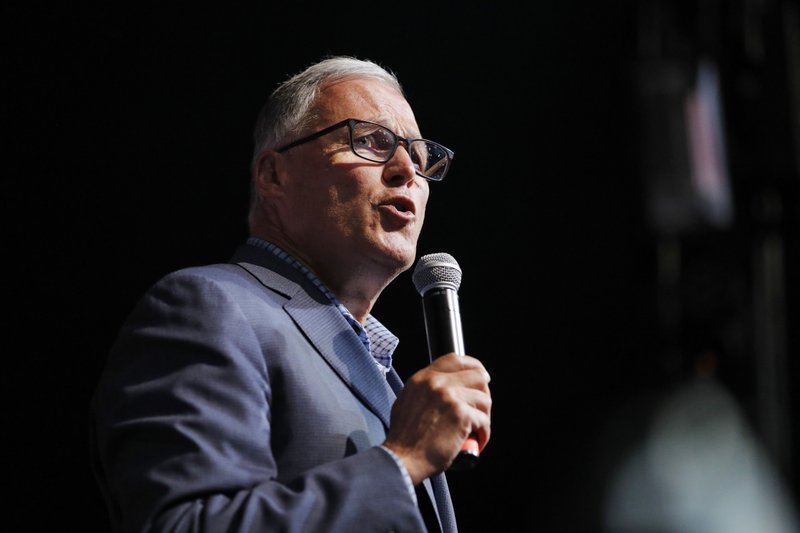 Democratic Presidential candidate Washington Gov. Jay Inslee speaks at the Iowa Democratic Wing Ding at the Surf Ballroom, Friday, Aug. 9, 2019, in Clear Lake, Iowa. (AP Photo/John Locher)