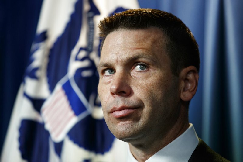 FILE - In this June 28, 2019 file photo, Department of Homeland Security (DHS) acting Secretary Kevin McAleenan pauses during a news conference in Washington. The Trump administration is moving to end a long-standing federal court agreement that limits how long immigrant children can be kept in detention. The move is almost certain to spark a new court fight over the government’s ability to hold families until their cases are decided. (AP Photo/Carolyn Kaster)