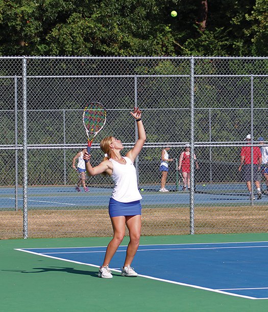 Sarah Primm/News-Times Parkers Chapel's Drue Thomas gets ready to serve during a singles match against Murfreesboro Tuesday at Parkers Chapel. Parkers Chapel recorded a sweep of Murfreesboro.