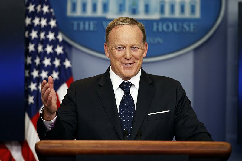 Former White House press secretary Sean Spicer smiles as he answers a question during a briefing at the White House, Tuesday, June 20, 2017 in Washington. 