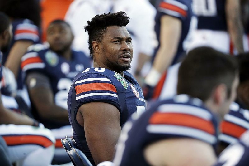 Auburn left tackle Prince Tega Wanogho, a native of Nigeria, now anchors the Tigers’ veteran offensive line. 