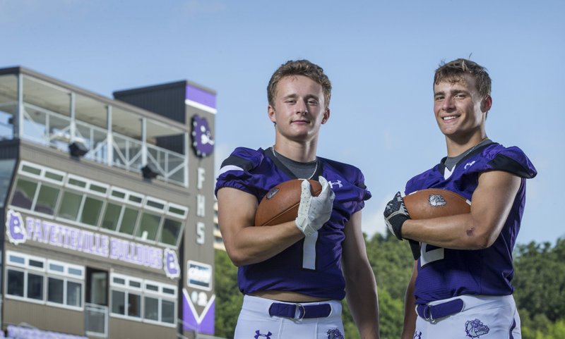 NWA Democrat-Gazette/BEN GOFF @NWABENGOFF
Beau Stuckey (left) and Connor Flannigan, Fayetteville wide receivers, pose for a photo Thursday, July 18, 2019, at Fayetteville's Harmon Stadium. 