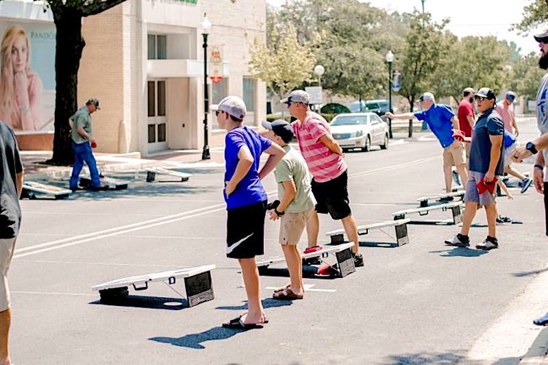 Participants take their chances in a Baggo tournament during Main Street El Dorado downtown summer events. The tournament will return Saturday for the final, 2019 installment of the Sumer events. Photo provided