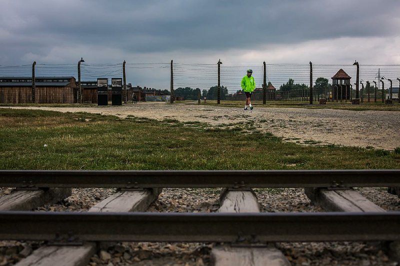 One of some 250 participants of Ride for the Living, a 60-mile biking event from Auschwitz to Krakow, Poland, outside the concentration camp.