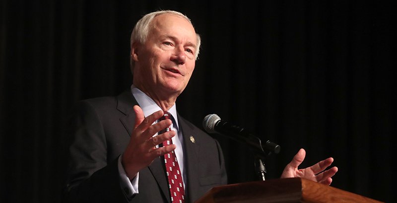 The Sentinel-Record/Richard Rasmussen CONFERENCE ADDRESS: Arkansas Gov. Asa Hutchinson addresses the Association of Arkansas Counties' annual conference Thursday at the Hot Springs Convention Center.