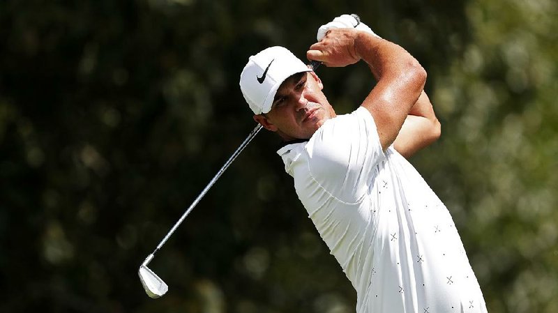 Brooks Koepka shot his second consecutive 3-under 67 on Friday and holds the lead after the second round of the Tour Championship at Atlanta.