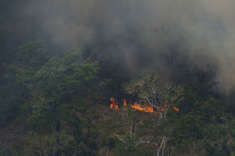 Wildfires consume an area of rain forest near Porto Velho in Brazil on Friday.