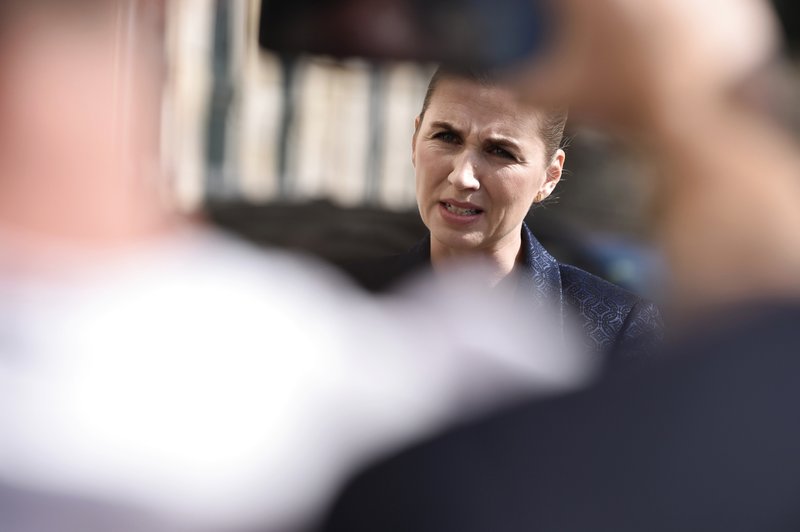 Denmark's Prime Minister Mette Frederiksen makes a comment on US President's cancellation of his scheduled State Visit, in front of the State Department in Copenhagen, Wednesday, Aug. 21, 2019. U.S. President Trump announced his decision to postpone a visit to Denmark by tweet on Tuesday Aug. 20, 2019, after Danish Prime Minister Mette Frederiksen dismissed the notion of selling Greenland to the U.S. as &quot;an absurd discussion.&quot; (Mads Claus Rasmussen / Ritzau Scanpix)