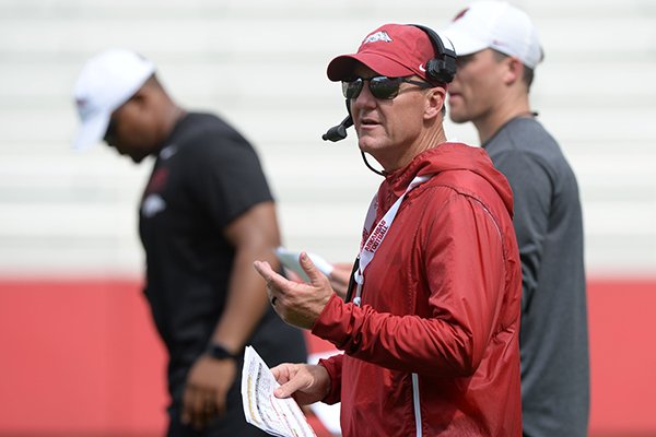 Arkansas coach Chad Morris watches Saturday, Aug. 24, 2019, during practice in Razorback Stadium in Fayetteville.