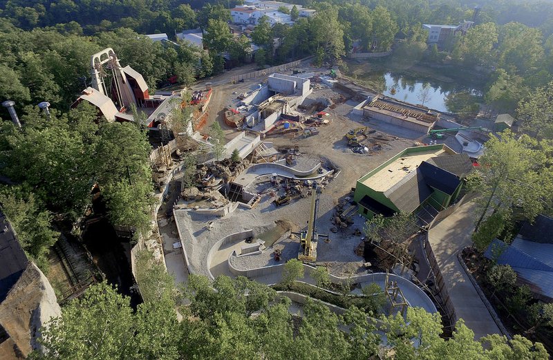 Photo courtesy Silver Dollar City Construction for Mystic River Falls has already used 22 semitrailer loads of re-enforcement bar, 187,650 cubic yards of concrete, 6,000 tons of landscaping rocks and 220,000 board feet of rough sawn timber.