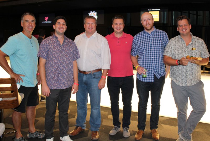 NWA Democrat-Gazette/CARIN SCHOPPMEYER Jody Sims (from left), Joel Eikenberry, Donovan Angel, Trenton Moss, Craig Pierce and Kevin Clauson gather at the Las Faygas benefit for The C.A.R.E. Initiative on Aug. 16 at the Walton Arts Center.