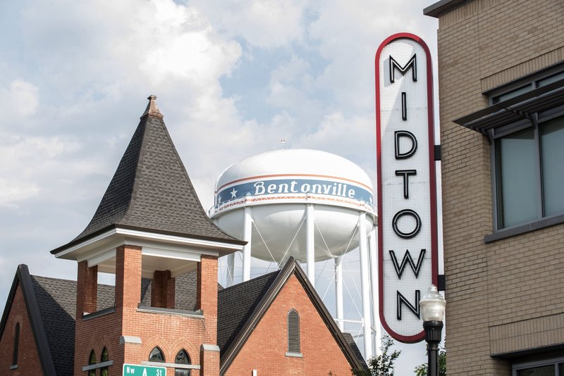 FILE -- The Preacher Son restaurant as well as the Bentonville water tower and Midtown building in downtown Bentonville Arkansas.