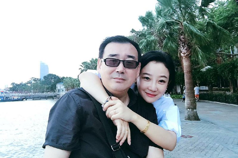 Australian writer Yang Hengjun and his wife, Yuan Xiaoliang, are shown in an undated photo. China has charged Yang as a spy. 