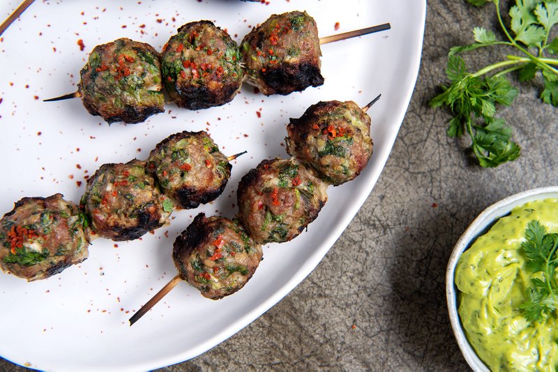 Enjoy these meatballs as a main dish or serve mini skewers as party appetizers. Photo by Mariah Tauger (Los Angeles Times/TNS)