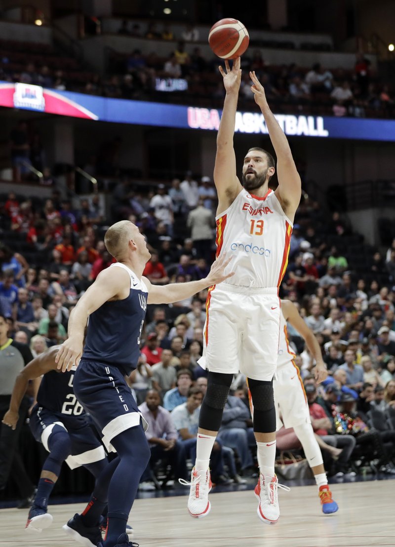 The Associated Press TOO HIGH: Spain's Marc Gasol, right, shoots over United States' Mason Plumlee during the first half of an exhibition basketball game Friday, Aug. 16, 2019, in Anaheim, Calif.