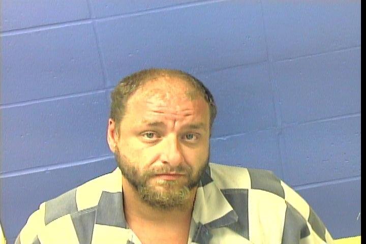 Jeffrey Horton surrendered to police Wednesday in connection to the sexual assault of two children.