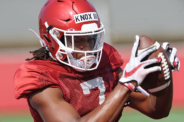 Arkansas receiver Trey Knox (7) makes a catch Tuesday, Aug. 6, 2019, during practice at the university practice field. 