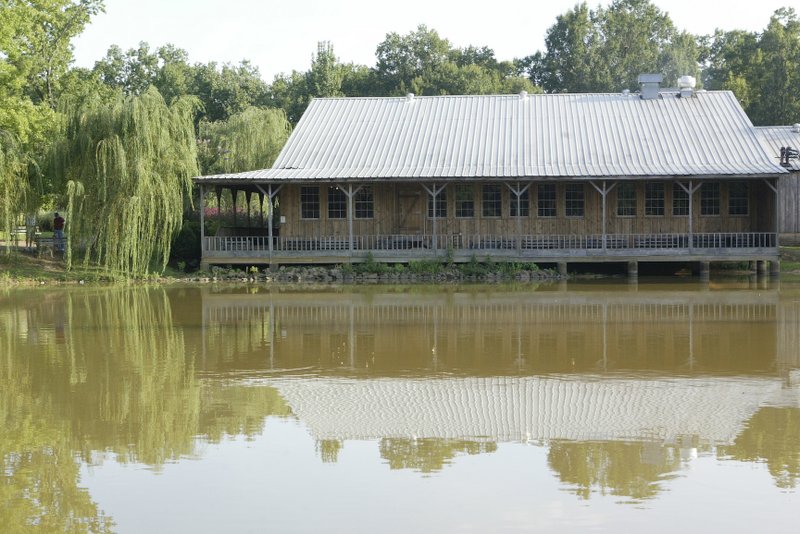 The former Cock of the Walk building is being turned into a restaurant/bar/event center called Cypress Social, scheduled to open in December. Democrat-Gazette file photo