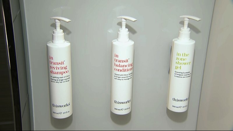 This image made from video shows bottles of shampoo, conditioner and shower gel that will replace smaller bottles of them by 2021, filmed at Marriott's headquarters in Bethesda, Md., Tuesday, Aug. 27, 2019. Marriott International, the world's largest hotel chain, said Wednesday it will eliminate small plastic bottles of shampoo, conditioner and bath gel from its hotel rooms worldwide by December 2020. (AP Photo/Dan Huff)